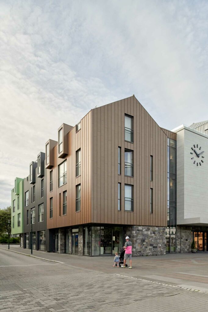 Green black and brown metal cladding building in Reykjavik, Iceland