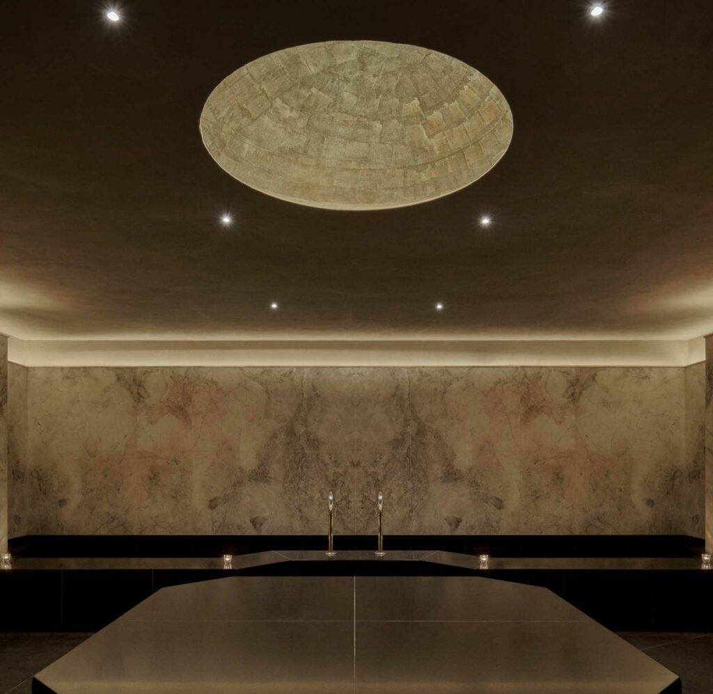 Steam room with medieval dome in the ceiling and low light environme